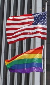 The Federal Reserve Bank proudly flies the rainbow flag under the American flag in support of LGBT Pride Month